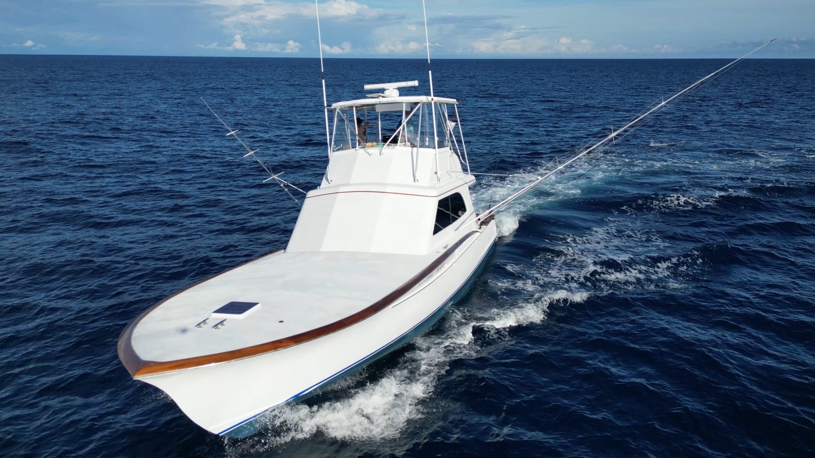 Plane to Sea sportfishing boat running offshore in Costa Rica